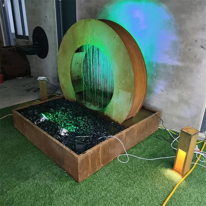 water feature garden with green light water feature garden with green light